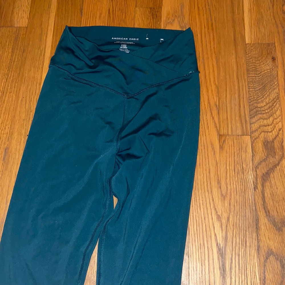 dark blue/greenish cross over American eagle leggings